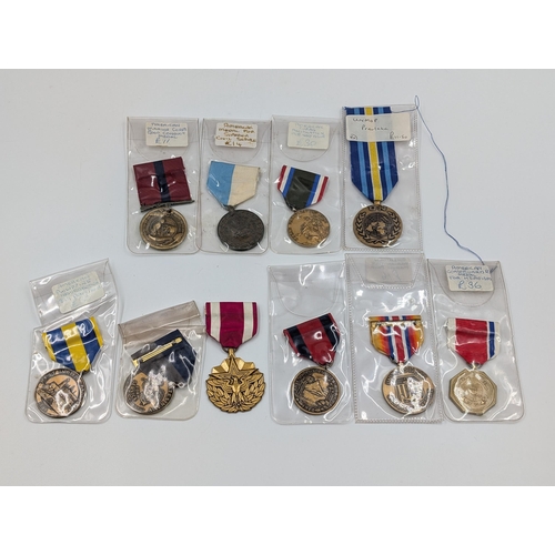 2165 - Ten military medals to include nine various American service and one U.N. In the Service of Peace