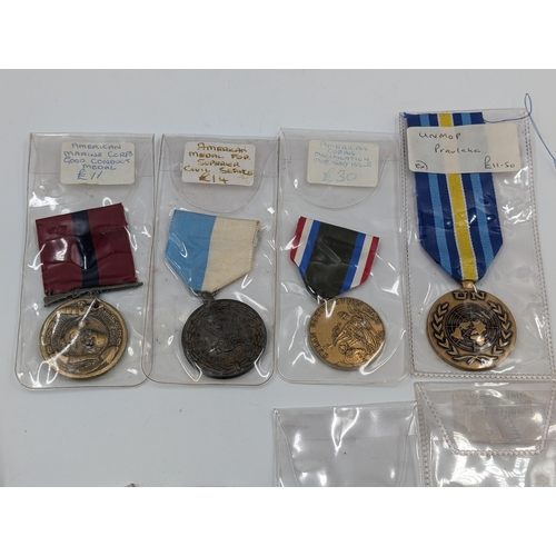 2165 - Ten military medals to include nine various American service and one U.N. In the Service of Peace