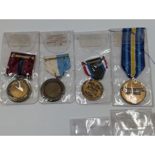 2165 - Ten military medals to include nine various American service and one U.N. In the Service of Peace