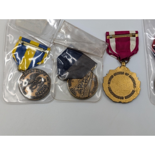 2165 - Ten military medals to include nine various American service and one U.N. In the Service of Peace