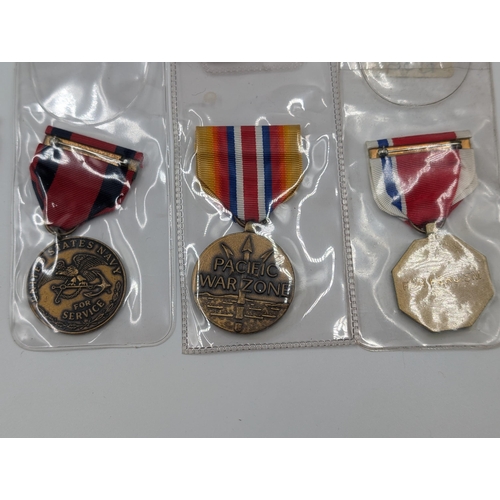 2165 - Ten military medals to include nine various American service and one U.N. In the Service of Peace