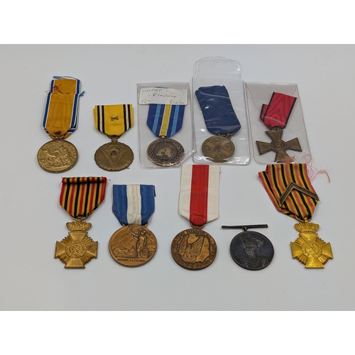 2168 - Ten military medals to include Italian Victory, Belgian Commemorative, Serbian Cross for Courage etc... 