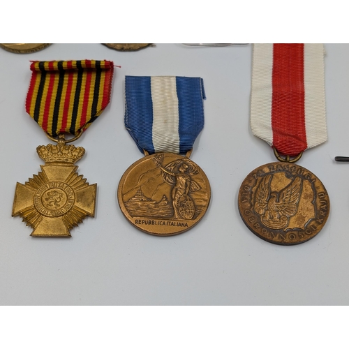 2168 - Ten military medals to include Italian Victory, Belgian Commemorative, Serbian Cross for Courage etc... 