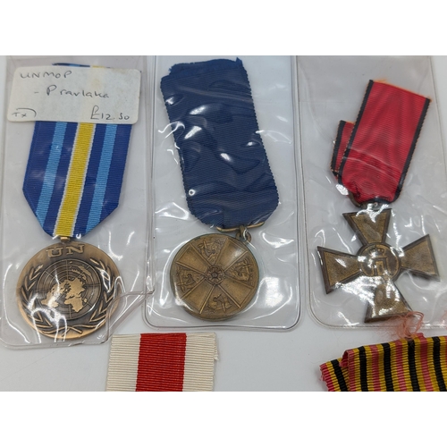 2168 - Ten military medals to include Italian Victory, Belgian Commemorative, Serbian Cross for Courage etc... 