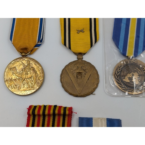 2168 - Ten military medals to include Italian Victory, Belgian Commemorative, Serbian Cross for Courage etc... 