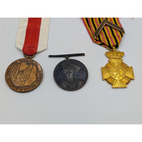 2168 - Ten military medals to include Italian Victory, Belgian Commemorative, Serbian Cross for Courage etc... 