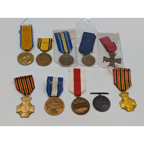 2168 - Ten military medals to include Italian Victory, Belgian Commemorative, Serbian Cross for Courage etc... 