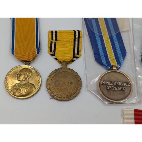 2168 - Ten military medals to include Italian Victory, Belgian Commemorative, Serbian Cross for Courage etc... 