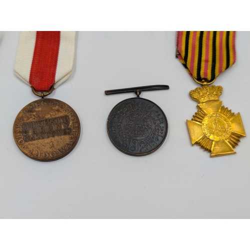 2168 - Ten military medals to include Italian Victory, Belgian Commemorative, Serbian Cross for Courage etc... 