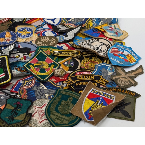 2175 - A quantity of embroidered military cloth patches