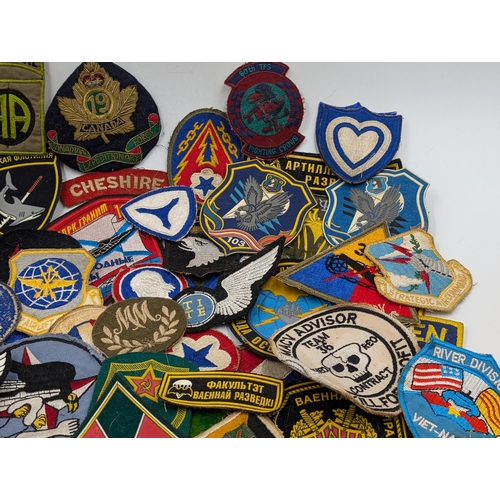 2175 - A quantity of embroidered military cloth patches