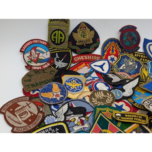 2175 - A quantity of embroidered military cloth patches