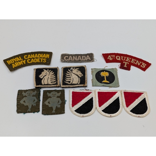 2176 - Ten embroidered military cloth patches to include Royal Canadian Army Cadets, 4th Queen's T, Lincoln... 