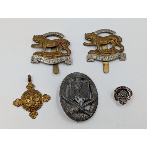 2177 - Five military items, two Leicestershire cap badges, one The St. John Ambulance Association medal pre... 