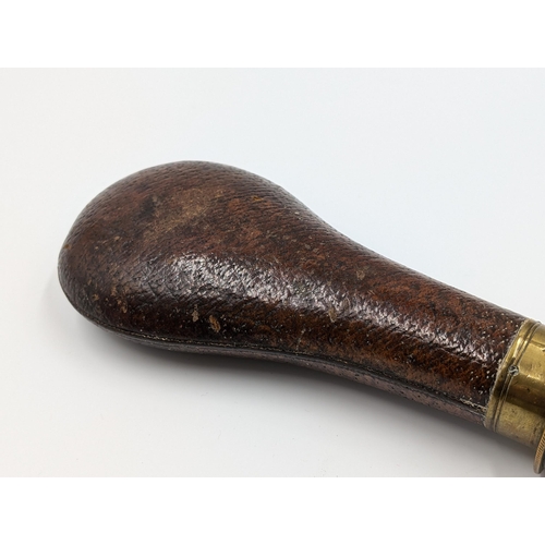 2178 - A 19th century brown leather and brass gun powder flask - approx. 20cm long