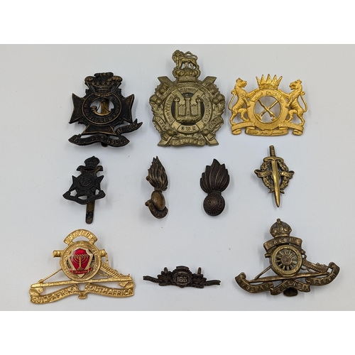 2179 - Ten military cap badges