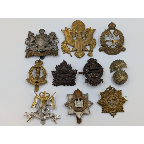 2180 - Ten military cap badges