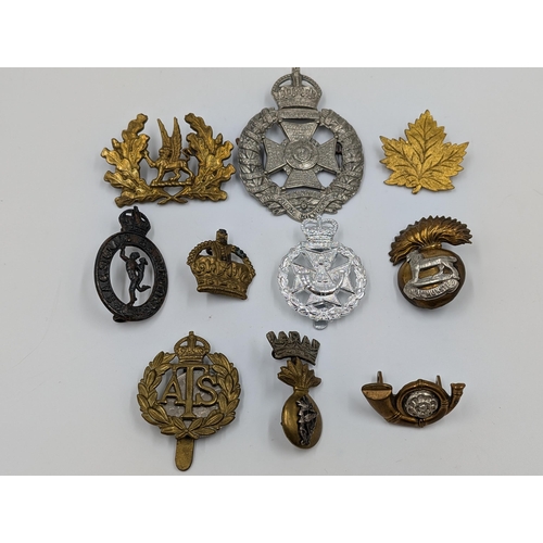 2181 - Ten military cap badges