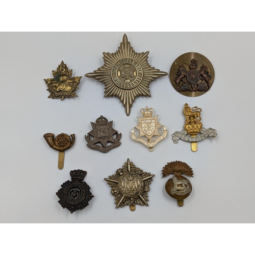 2182 - Ten military cap badges