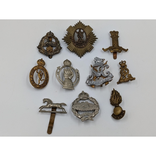 2183 - Ten military cap badges