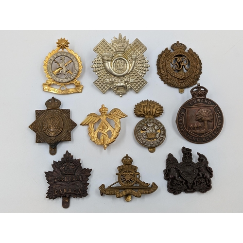 2187 - Ten military cap badges