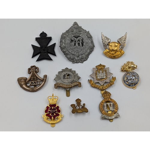 2189 - Ten military cap badges