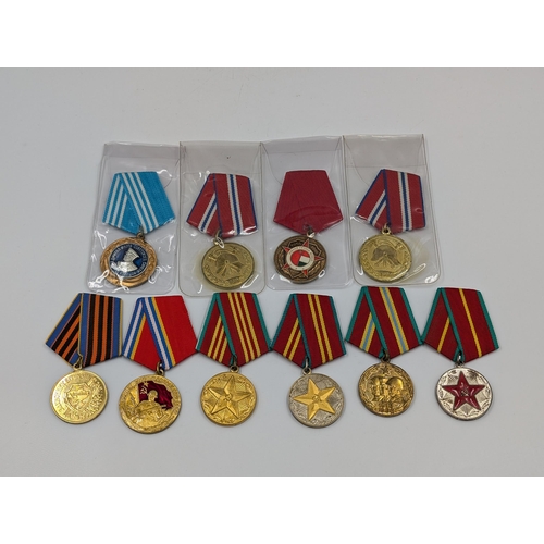 2210 - Ten Russian military medals to include Southern Group of Forces, Impeccable Service, 150 years of Fi... 