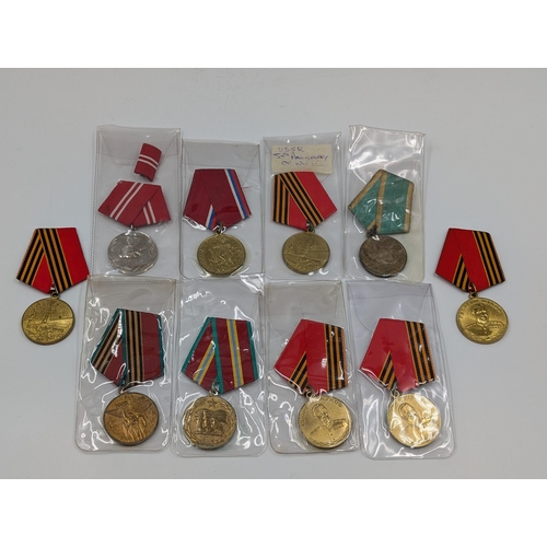 2211 - Ten military medals to include German Long Service, Russian 100 Years Anniversary Medal etc.