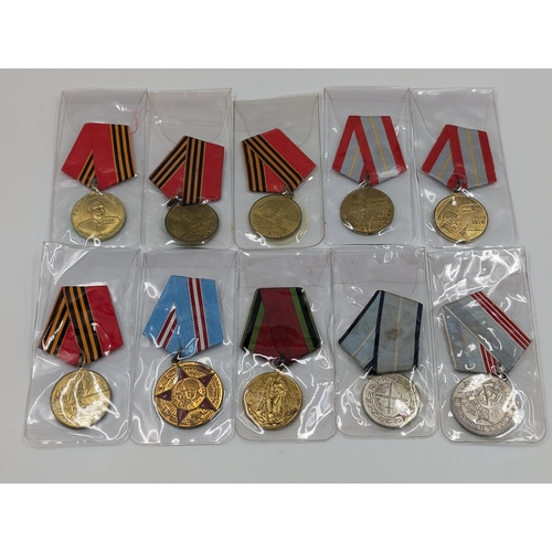 2212 - Ten Russian military medals to include WWII Veteran of Labour, 50 Years of the Armed forces etc.