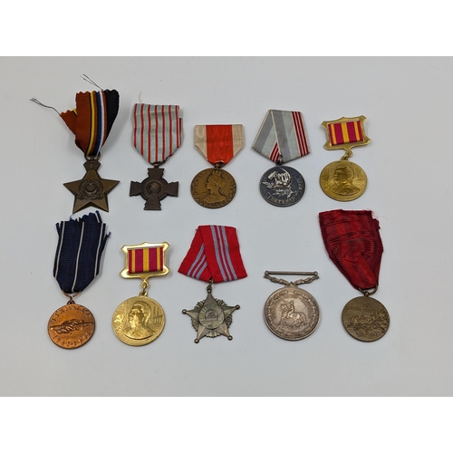 2217 - Ten military medals to include Czechoslovakian Service to Homeland, South African .925 silver De Wet... 