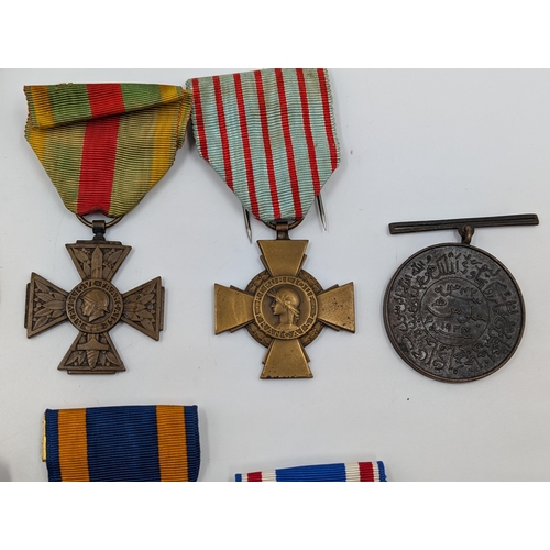 2218 - Ten military medals to include WWI Italian War Merit Cross, 1980 Zimbabwe Independence, U.S. Air For... 