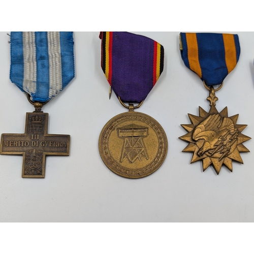 2218 - Ten military medals to include WWI Italian War Merit Cross, 1980 Zimbabwe Independence, U.S. Air For... 