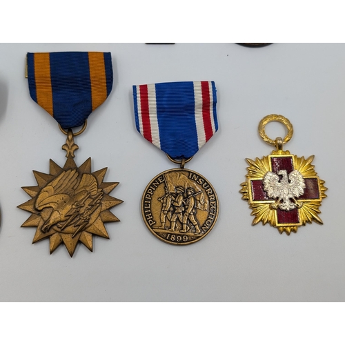 2218 - Ten military medals to include WWI Italian War Merit Cross, 1980 Zimbabwe Independence, U.S. Air For... 