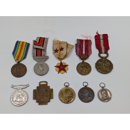 2219 - Ten military medals to include Belgian WWI Croix de Feu, Czechoslovakian Revolution Cross, Portugues... 