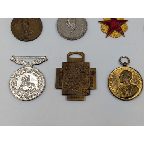 2219 - Ten military medals to include Belgian WWI Croix de Feu, Czechoslovakian Revolution Cross, Portugues... 