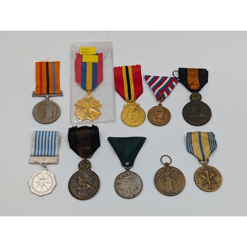 2220 - Ten military medals to include WWI Belgian Yser, Congo Civil Merit, U.S. Navy Armed Forces etc.