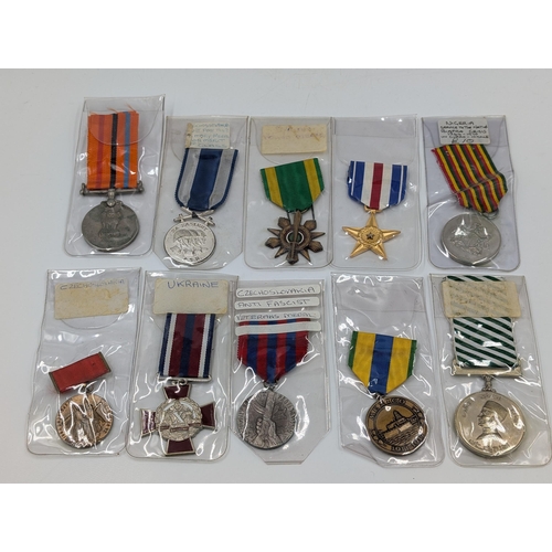 2221 - Ten military medals to include Nigerian Service to the Nation, Czechoslovakian Anti Fascist Veterans... 