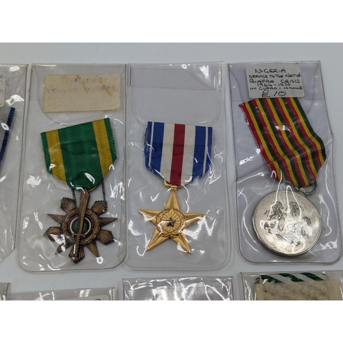 2221 - Ten military medals to include Nigerian Service to the Nation, Czechoslovakian Anti Fascist Veterans... 