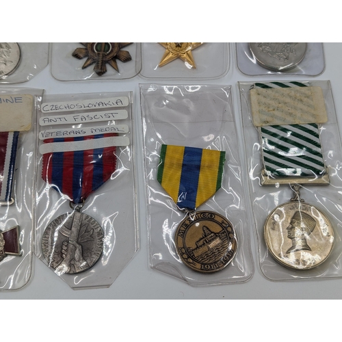 2221 - Ten military medals to include Nigerian Service to the Nation, Czechoslovakian Anti Fascist Veterans... 