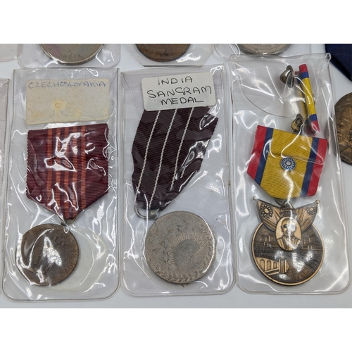 2222 - Ten military medals to include WWII Chinese Commemorative, Indian Sangram, WWI Belgian Volunteers et... 