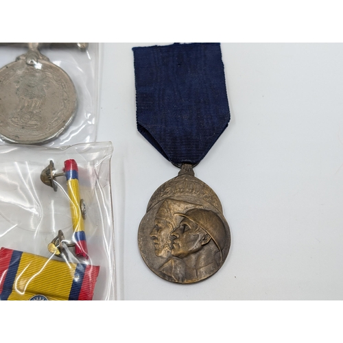 2222 - Ten military medals to include WWII Chinese Commemorative, Indian Sangram, WWI Belgian Volunteers et... 