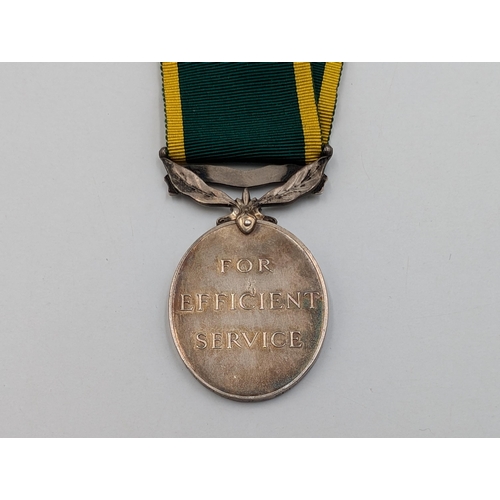 2226 - A WWII British Territorial Efficiency Medal presented to Lt. S. H. King R.A.