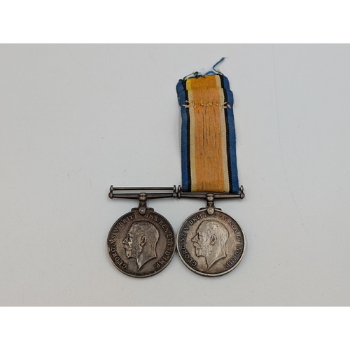 2233 - Two WWI British War medals, one presented to M2-11203 J. W. Bennett A. S. C. and one presented to 23... 