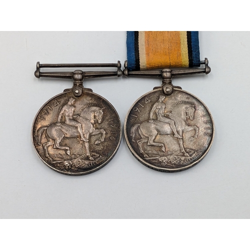 2233 - Two WWI British War medals, one presented to M2-11203 J. W. Bennett A. S. C. and one presented to 23... 