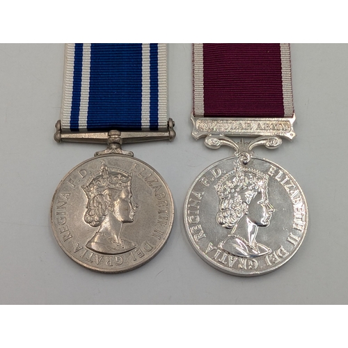 2234 - Two Queen Elizabeth II British medals, one For Long Service and Good Conduct and one Police Long Ser... 