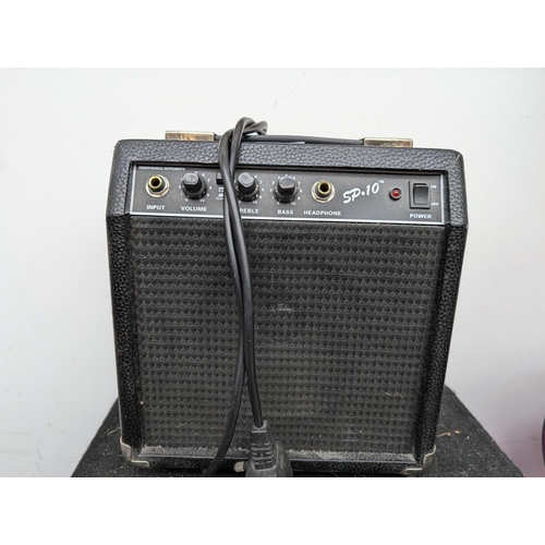 917 - Two guitar amplifiers, one Acoustic Solutions JE50 and one Squier SP10