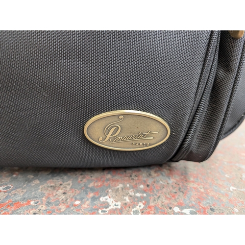 919 - Two items, one P. Mauriat contoured saxophone gig bag and one bag containing a large collection of s... 