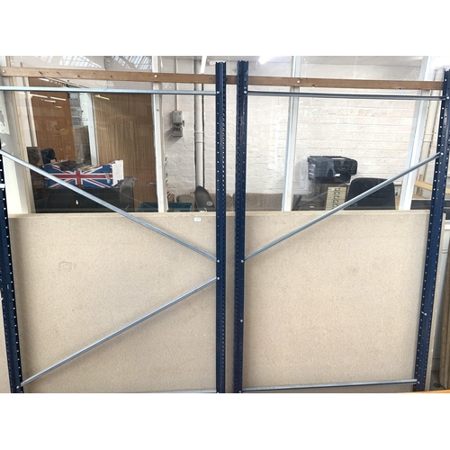 1039A - A blue metal single bay pallet racking system with various orange stretcher bars, aluminium supports... 