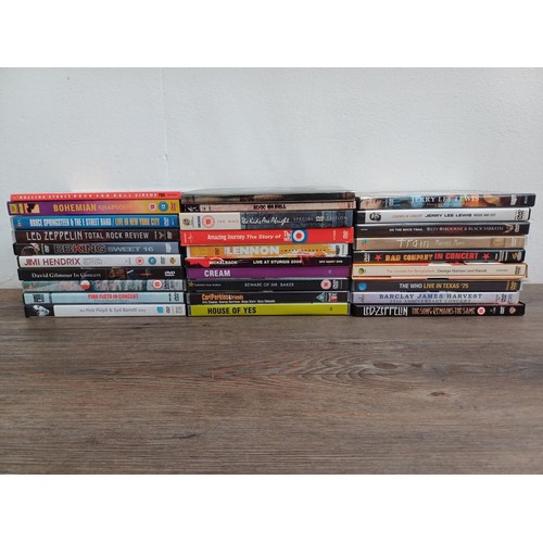 873 - A collection of music DVDs to include, The Who, Pink Floyd, Jimi Hendrix, Led Zeppelin, ACϟDC, John ... 