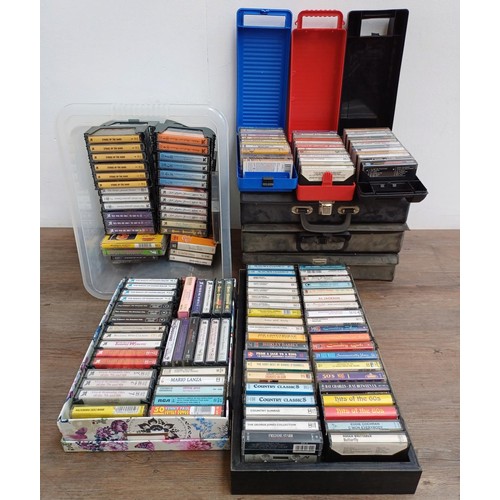 874 - A large collection of compact cassettes to include Chuck Berry, Glen Campbell, Tom Jones, Roy Orbiso... 